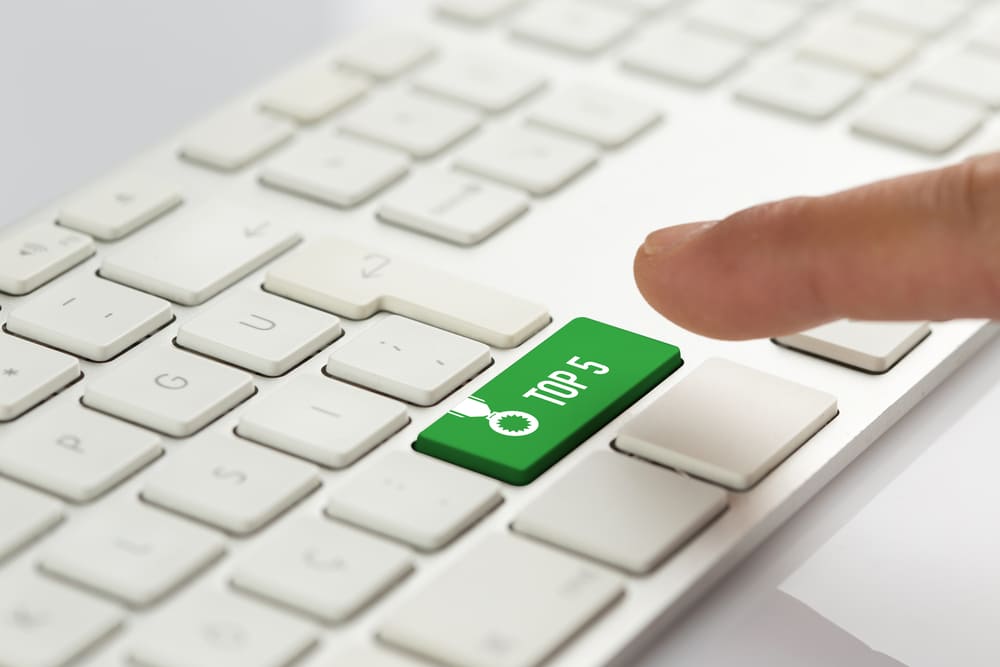 Top 5 de cursos de tráfego pago dentro da tecla de um computador