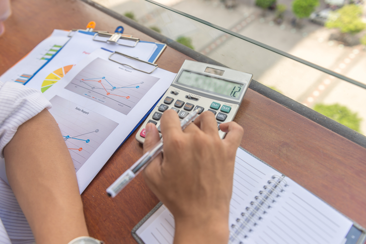 close-up-of-accountant-hand-using-calculator-while-2026-01-11-10-36-42-utc (1)